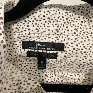 Men’s size medium Marc Anthony collared shirt. White with res flower pattern.